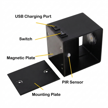 LUNIFY Boca compact aluminium wall light mounted on a slatted wood wall, casting a warm 2700K up-and-down glow. Wireless rechargeable LED wall lamp with motion sensor and magnetic mounting for wire-free indoor installation.